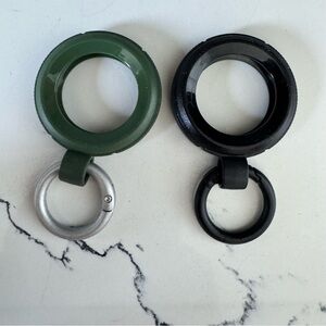 2 Otterbox Rugged Protective AirTag Case 1 All Black, 1 Green w Silver